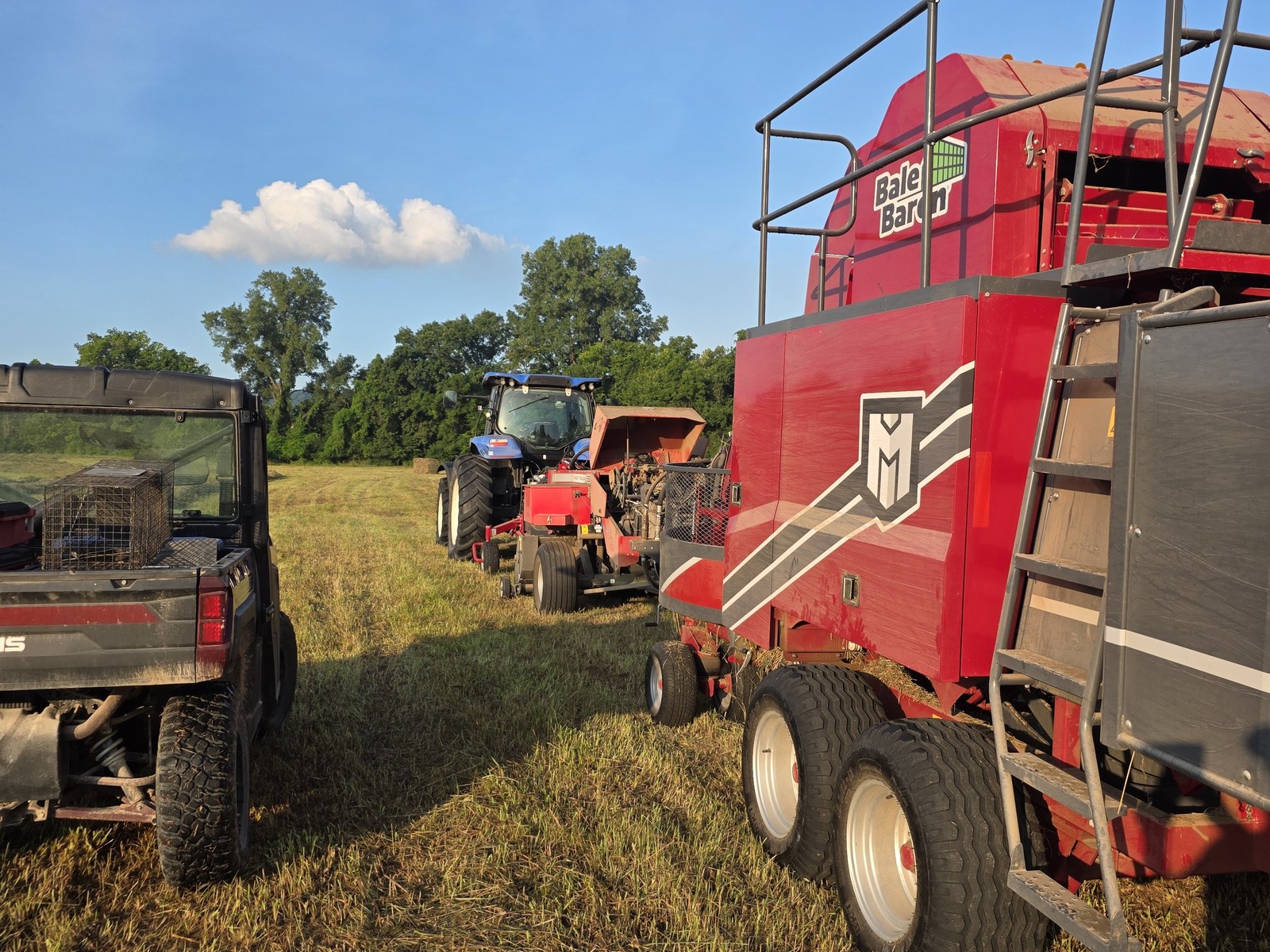 Bale Baron hay equipment working in a BV Farms field in Defiance, Missouri